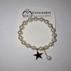 pearl beaded bracelet with gold star charm 1